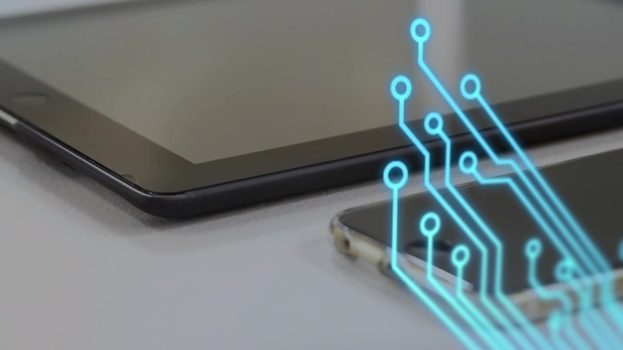 Digital Circuit Board Animation Connecting Tablet and Smartphone