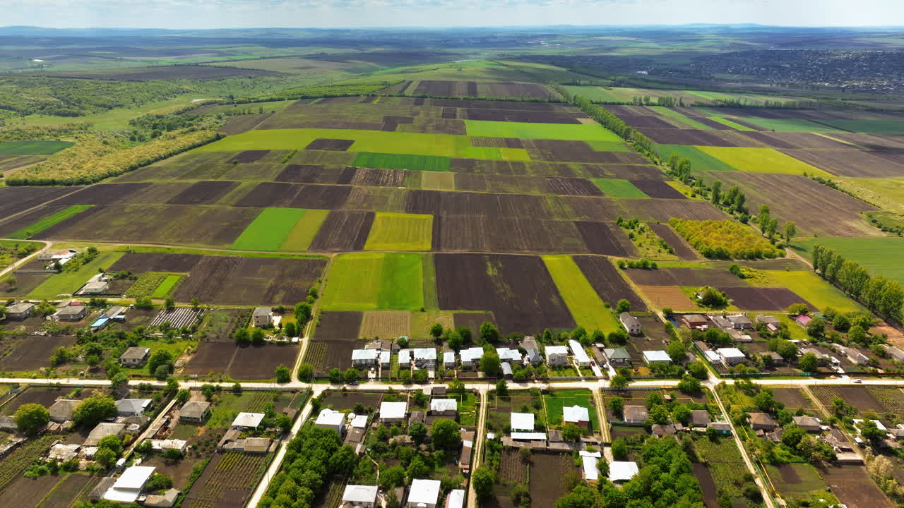 Aerial drone view of Pelinia, Drochia, Moldova with a cloudy sky