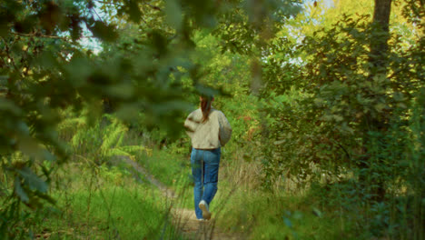 woman hiking in a forest