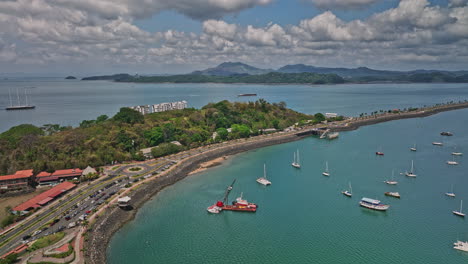 panama city aerial v95 panoramic panning view capturing beautiful naos island with avenue leading to amador with urban cityscape in the skyline - shot with mavic 3 cine - april 2022