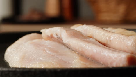 smoked fish fillets in a pan
