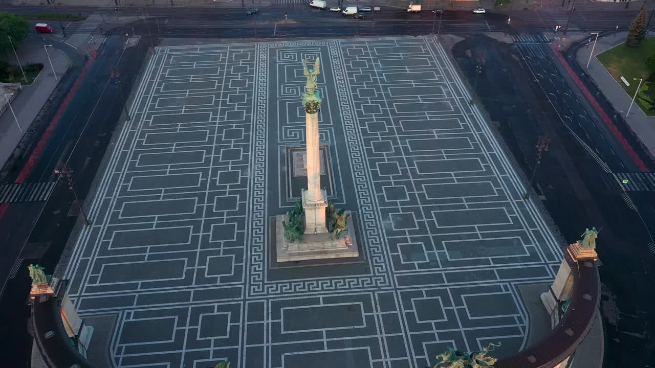 Drone footage of the empty Heroe's Square in Budapest, Hungary at the time of the Covid virus. Early morning at the sunrise in spring.
Drone circles.