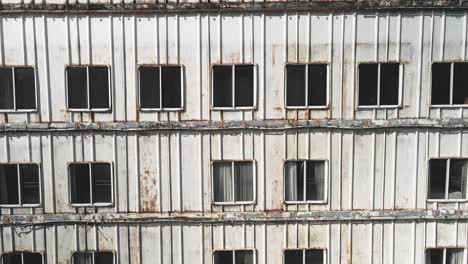 an old design structure of old ferry boat, drone inspecting an old design windows, steel work inspected by drone