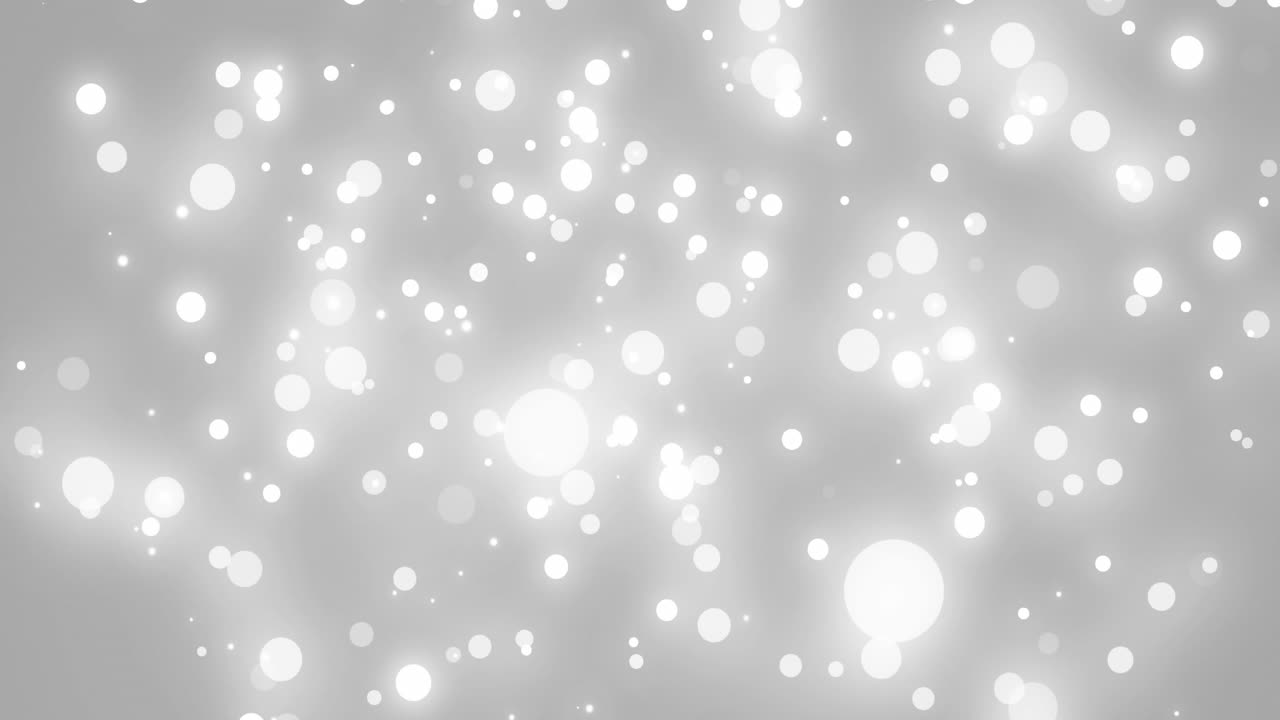 animación de manchas blancas brillantes que caen sobre un fondo gris