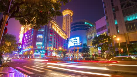 night illuminated shanghai city center traffic street crossroad panorama 4k time lapse china