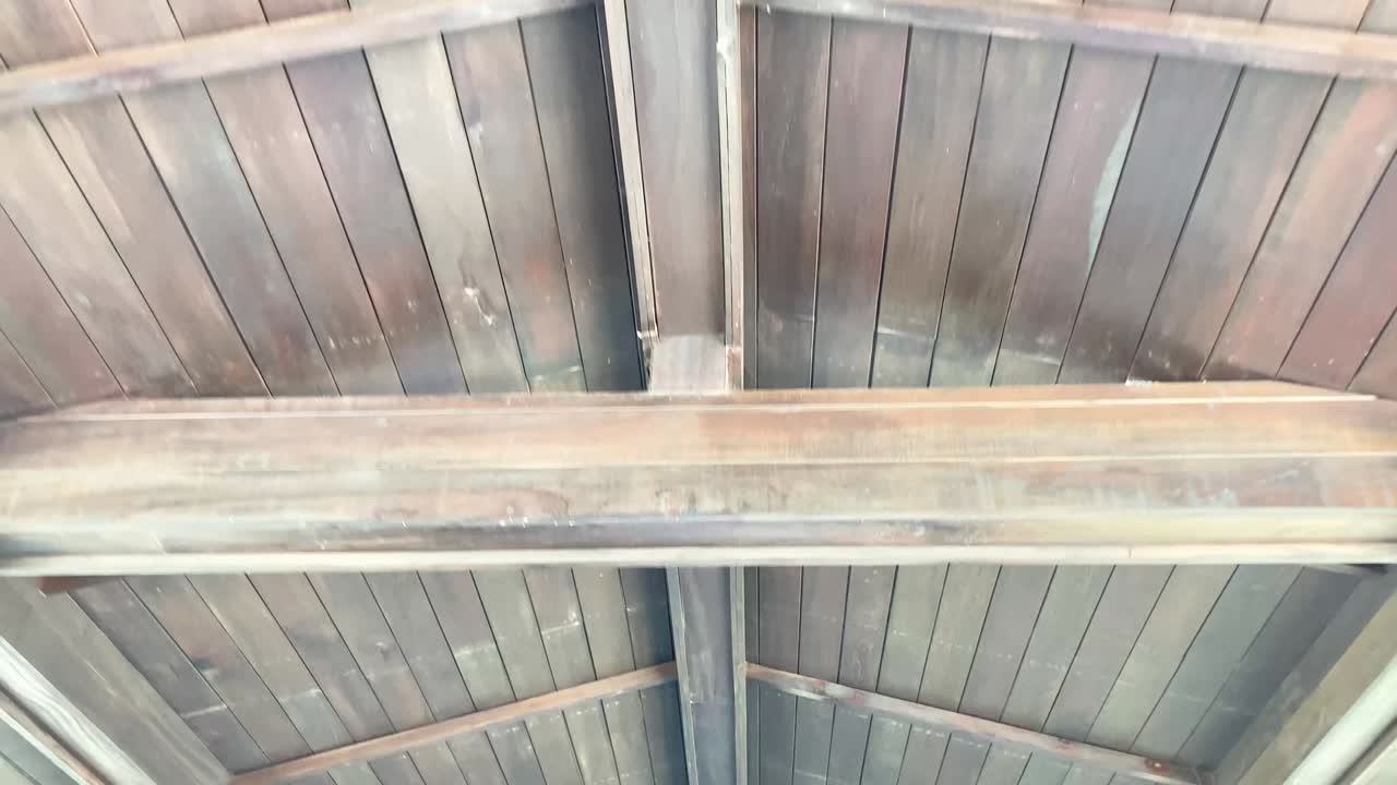 low angle view of wooden ceiling, pattern, or texture of wood. interior design