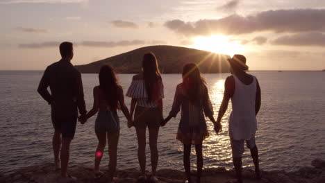 Friends-Standing-On-Cliff-Watching-Sunset-Shot-On-R3D