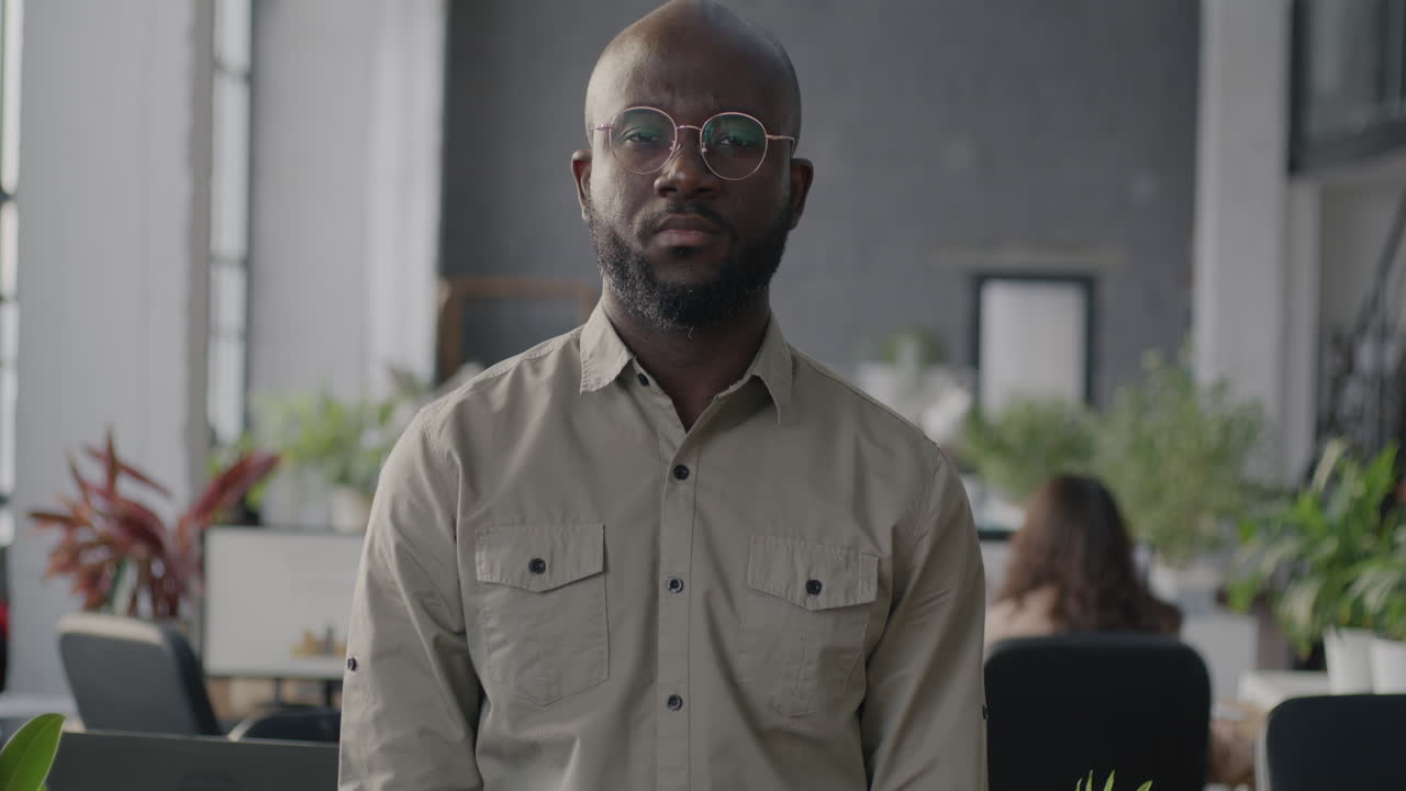 Serious Black Business Man in Office
