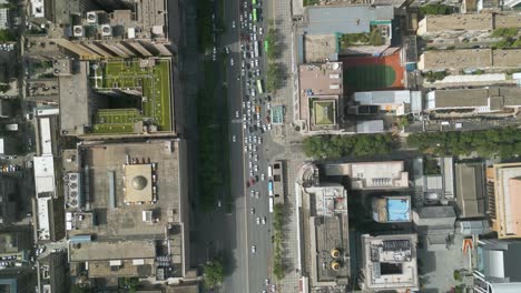 bird-eye aerial drone view over street traffic at, xian, large city and capital of shaanxi province in central china