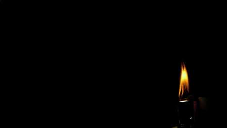animación de formas rojas sobre la mano sosteniendo un encendedor sobre fondo negro