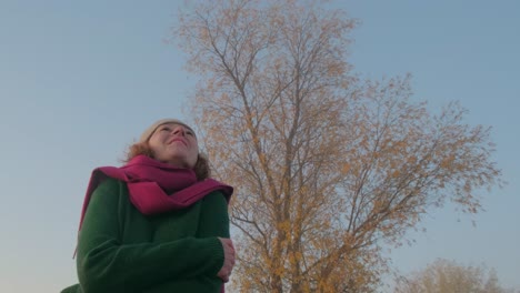 woman enjoying a beautiful autumn morning