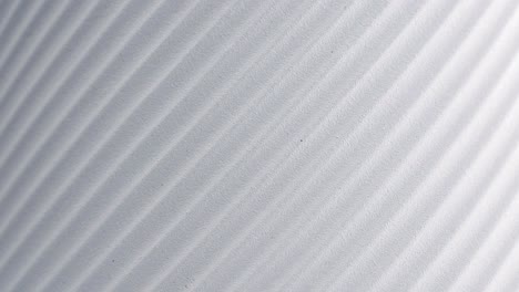 white waves of sand texture.