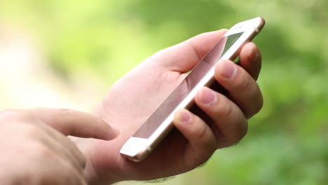 male teenager writing mobile phone