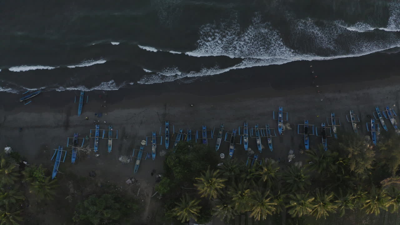 Fishing Boats on a Beach at Sunrise/Sunset