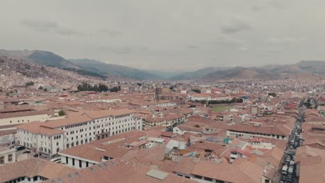 fly over cuzco old city in southeastern peru, near sacred valley. aerial drone shot