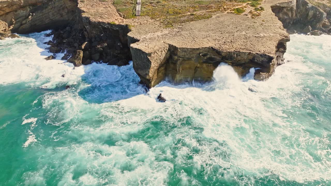 From crashing waves to the rugged cliffs, every frame tells the story of the ocean's relentless force carving its mark on the resilient shoreline of Portugal.