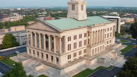 tennessee state capitol building. aerial reveals building, flag