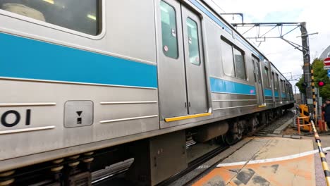 passenger train approaching and stopping at platform