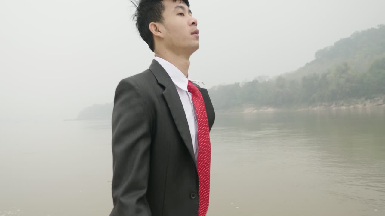 Businessman by the River