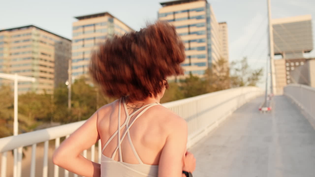 Young Sporty Woman Jogging in the City