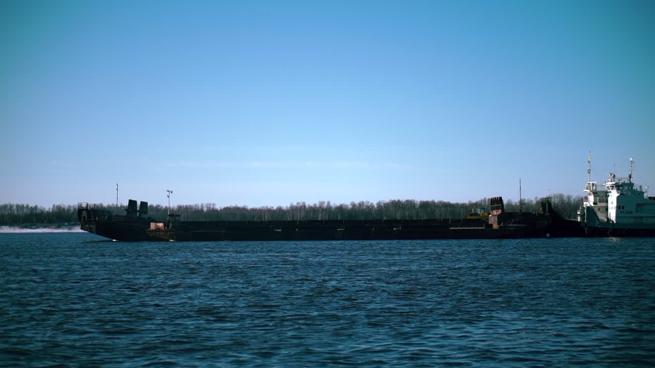 Tugboat and Barge on a River