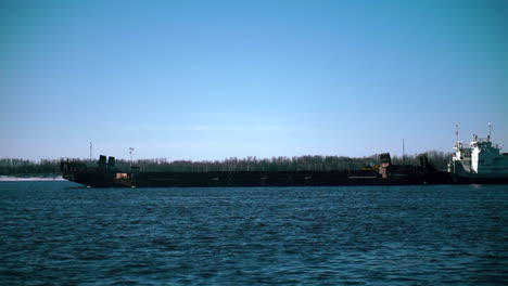 tugboat and barge on a river