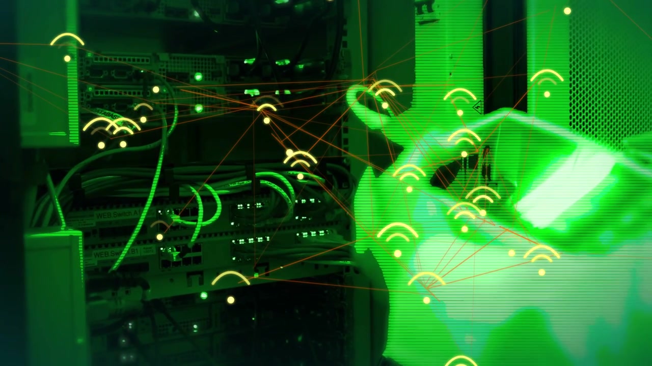 IT tech hand angling device toward rack, activating wireless icons mapping topology, marking cables