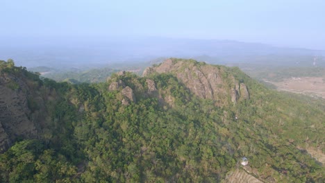 drone view of rock hill with tropical forest