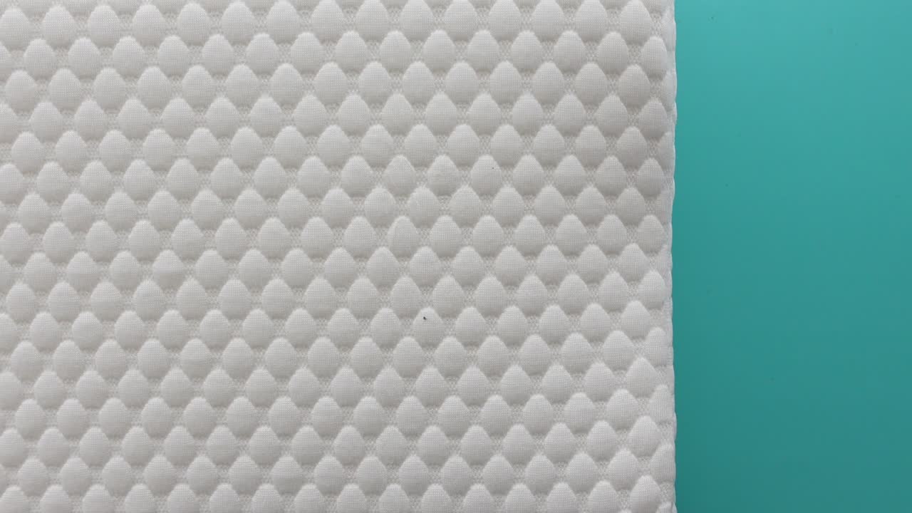 textura de tela acolchada blanca