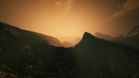 High-mountain-peaks-covered-with-dramatic-heavy-fog