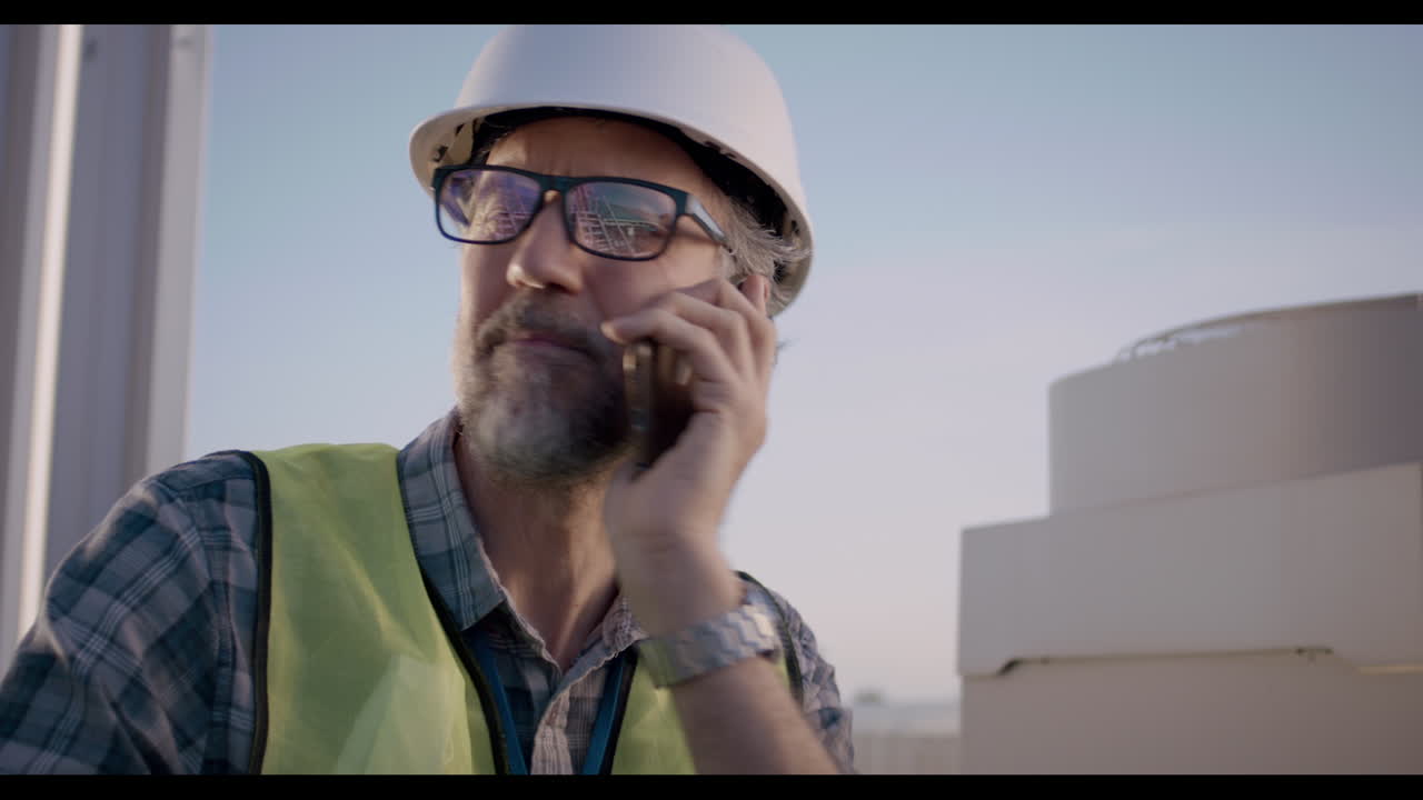 Construction Worker on a Rooftop