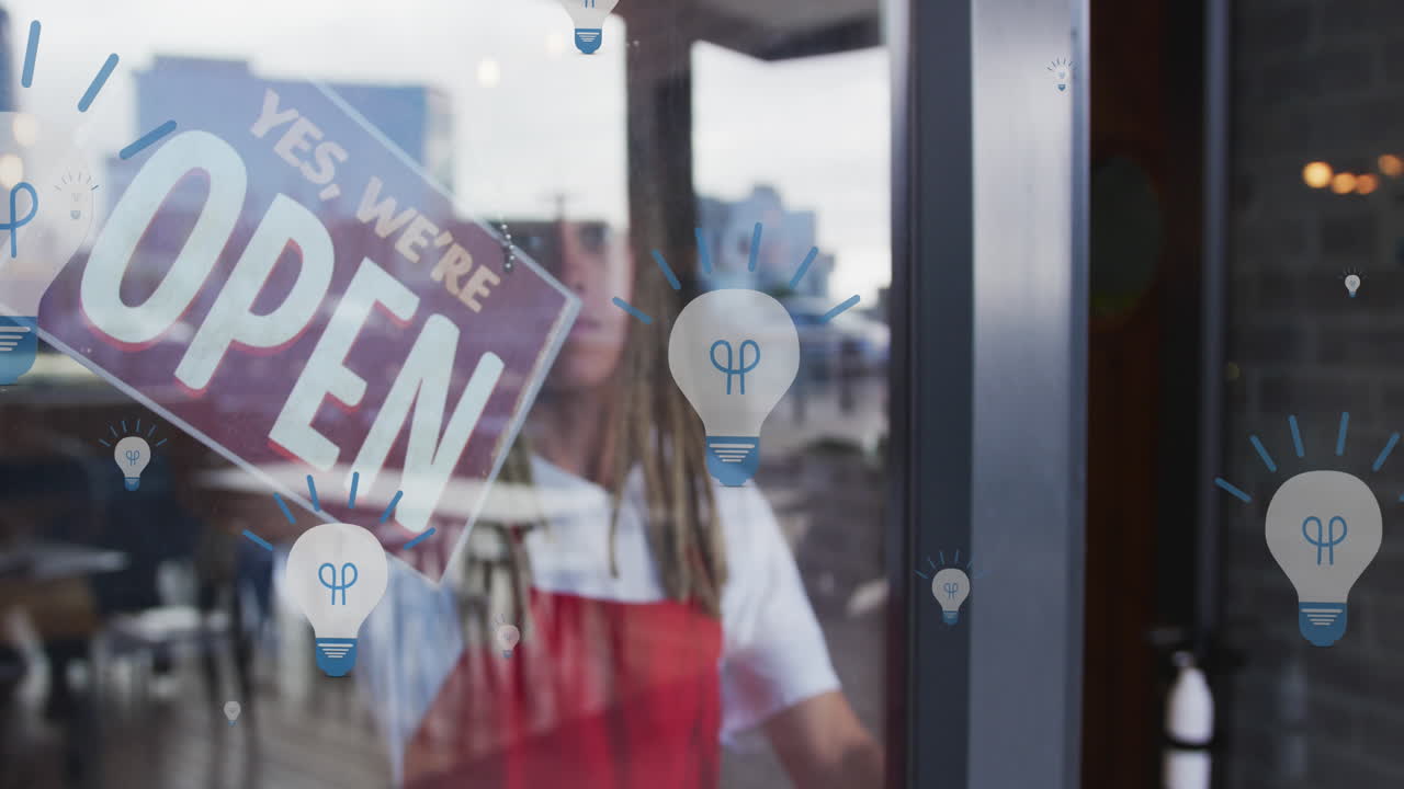 Animation of light bulb icons, biracial woman closing door and rotating open board to close board