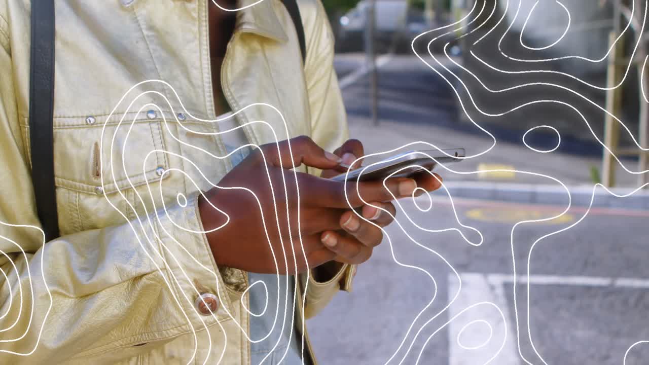 Animation of moving shapes over woman using smartphone