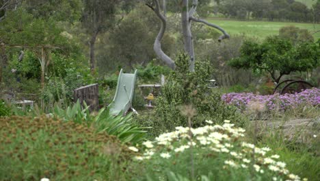 Open-wide-farm-with-nature-and-playground-with-kids-slide