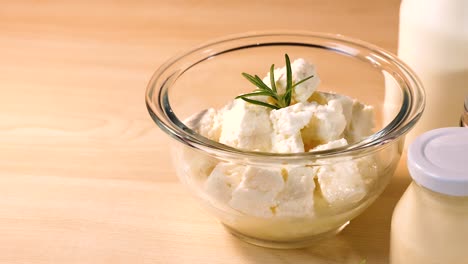 assorted dairy products on a wooden table