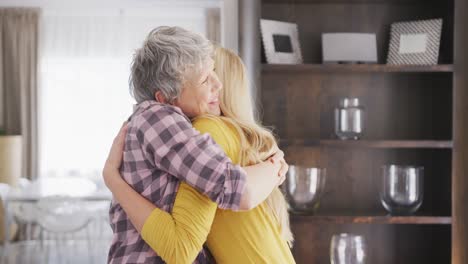 mother and daughter hugging each other