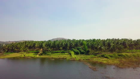 drone view of ramanagara lake with hills at background in karnataka, india.