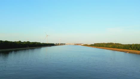 drone flight over the albert canal tilting camera into the water