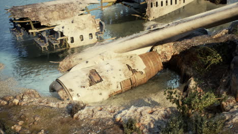 abandoned airplane wreckage on a beach