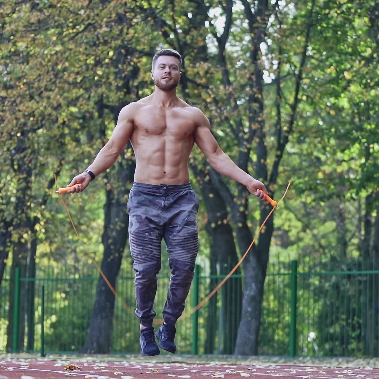 Athlete doing exercise at stadium