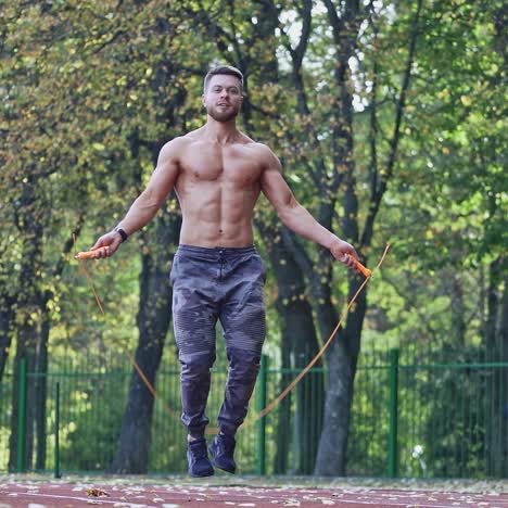 athlete doing exercise at stadium