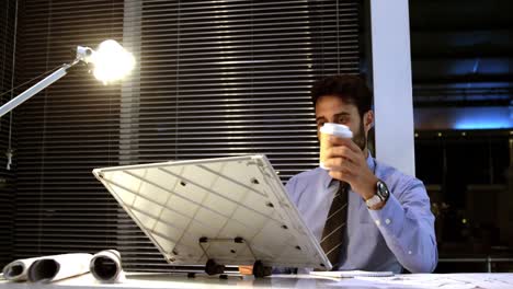 Businessman-looking-at-whiteboard