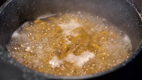 boiling pasta in hot pan