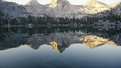 stunning reflection of mountains in a crystal clear lake