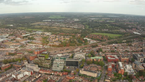 aerial slider shot of high speed train passing through watford station