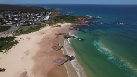 birubi beach with anna bay point lookout in new south wales, australia - aerial shot