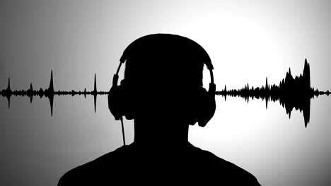 mens black silhouette against grey wall listen to music wearing headphones, realtime waveform in background