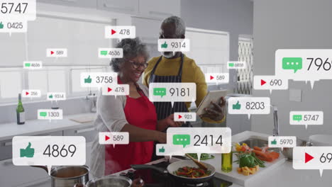 animación de barras de notificación sobre una pareja afroamericana que utiliza una tableta digital mientras cocina comida