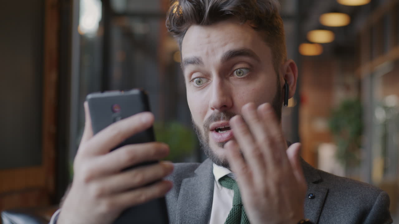 Businessman on a Video Call in a Cafe