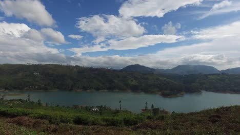 view to lake or river from land hills